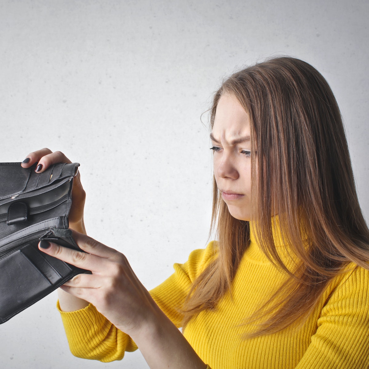 Photo by Andrea Piacquadio: https://www.pexels.com/photo/woman-holding-black-walPhoto by Andrea Piacquadio: https://www.pexels.com/photo/woman-holding-black-wallet-3768145/let-3768145/