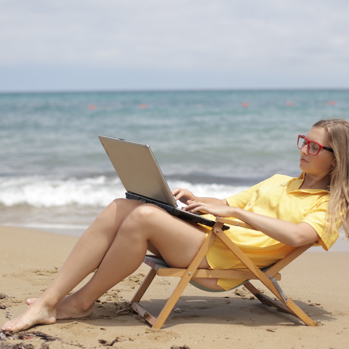 Photo by Andrea Piacquadio: https://www.pexels.com/photo/woman-in-yellow-shirt-sitting-on-brown-wooden-folding-chair-on-beach-3785612/, travel