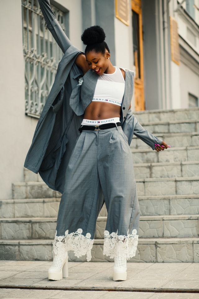 Photo by Godisable Jacob: https://www.pexels.com/photo/woman-in-gray-blazer-stands-on-gray-concrete-floor-914668/