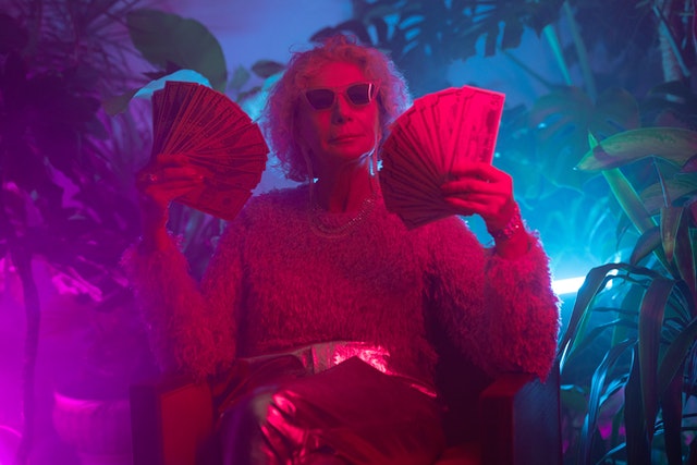 Photo by Ron Lach : https://www.pexels.com/photo/photo-of-an-elderly-woman-holding-money-7884129/, summer slow down