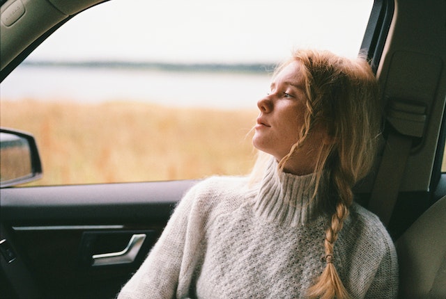 Photo by Anastasia Shuraeva: https://www.pexels.com/photo/woman-in-sweater-sitting-inside-a-car-4091200/