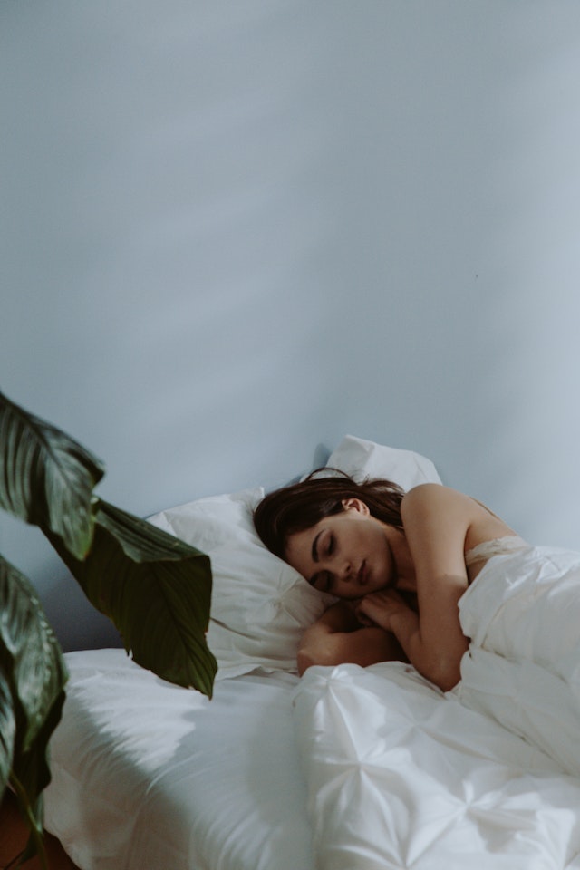 Photo by cottonbro: https://www.pexels.com/photo/beautiful-woman-sleeping-on-bed-10061441/, name
