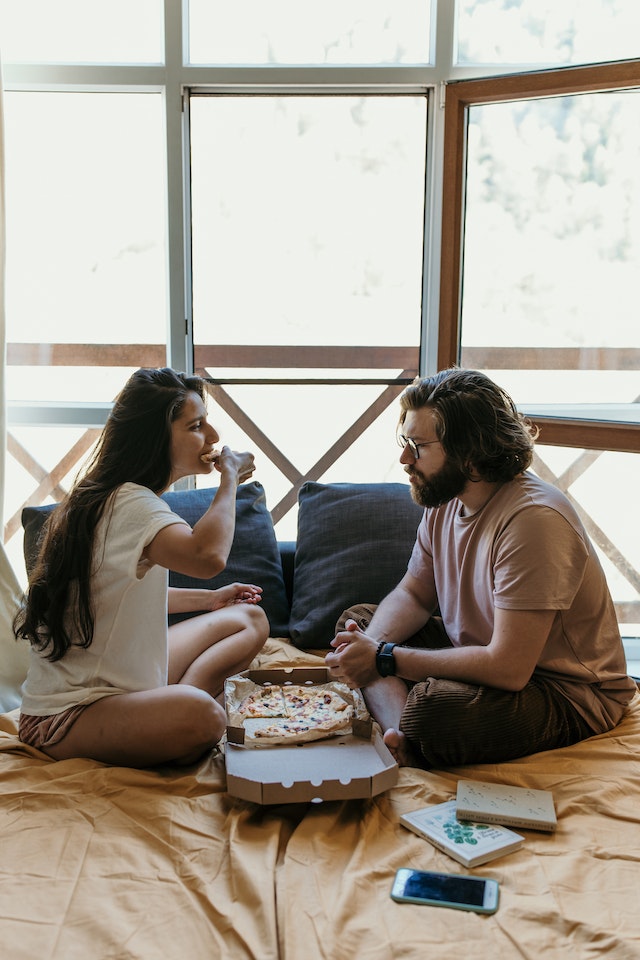 Photo by Anastasia Shuraeva: https://www.pexels.com/photo/couple-eating-pizza-together-4406679/