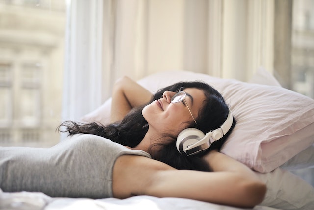 Photo by Andrea Piacquadio: https://www.pexels.com/photo/woman-in-gray-tank-top-lying-on-bed-3807729/