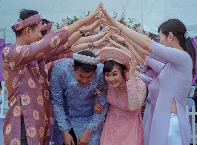 Photo by Min An: https://www.pexels.com/photo/wedding-couple-taking-a-traditional-ceremony-758898/